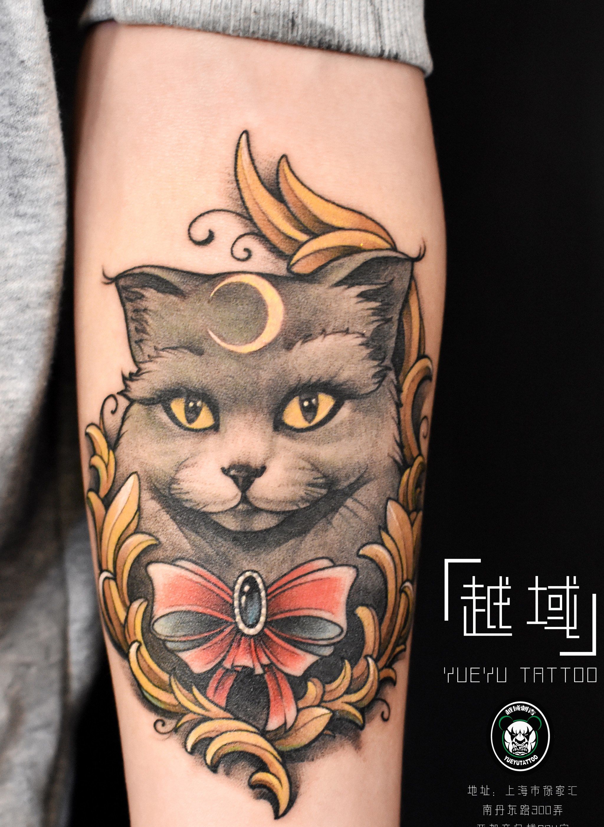 手臂猫咪纹身图案