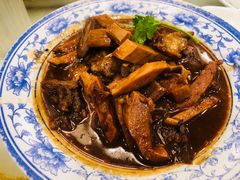 招牌小碗炖牛板筋-京门老爆三·铜锅涮肉 爆肚(望京店)