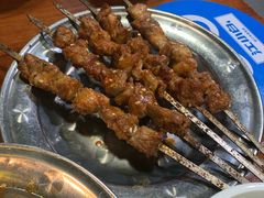 -明何记涮牛肚(品牌首店隋唐植物园南门古城路店)
