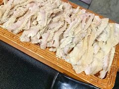 -明何记涮牛肚(品牌首店隋唐植物园南门古城路店)