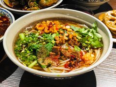 -爆炸头阿姨小四川正宗川味小吃(无任何分店)