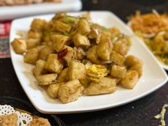 -明何记涮牛肚(品牌首店隋唐植物园南门古城路店)