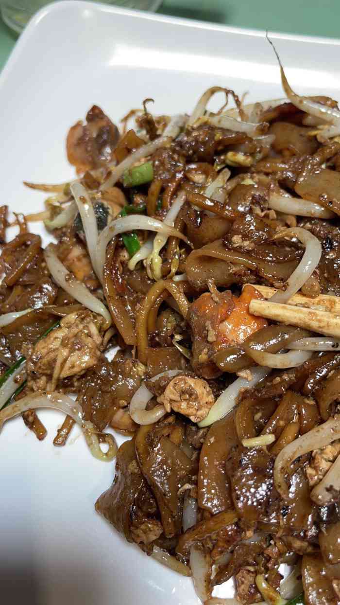 禧街炒粿条-"炒果条呢,在新加坡是国民美食之一,这从中.