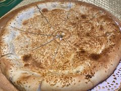 馕坑芝麻馕-巴扎美食·新疆菜·西域歌舞表演餐厅(新疆大厦店)