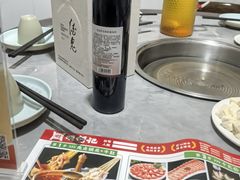 -明何记涮牛肚(品牌首店隋唐植物园南门古城路店)