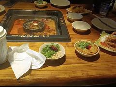 -老牌坊云南鱼豆花火锅(哈西万达店)