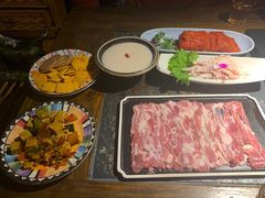 -老牌坊云南鱼豆花火锅(哈西万达店)