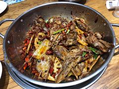 爆辣干锅鸭头-安诚居干锅鸭头(八角店)