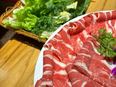 -明何记涮牛肚(品牌首店隋唐植物园南门古城路店)