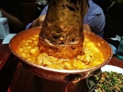 土司铜锅油焖鸡-浩海火烧云傣家菜(京广店)