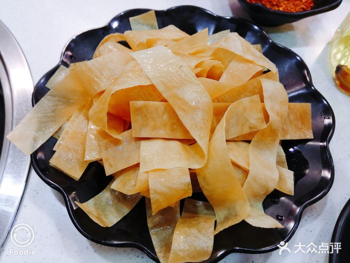 三江汇火锅店油豆皮图片