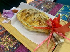 塔城酥皮面包烤羊腿-烟疆印象新疆菜(万联广场店)