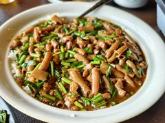 -曼听小寨海鲜烧烤·大连辣炒大王(盖州街店)