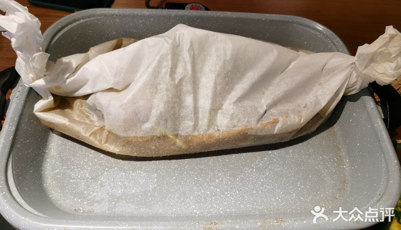 刚上来时是用纸裹着的，然后加热