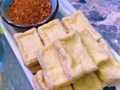 蒜香包浆豆腐-浩海火燒雲傣家菜(芮欧百货店)