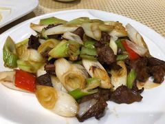 葱爆羊羔肉-巴扎美食·新疆菜·西域歌舞表演餐厅(新疆大厦店)
