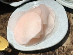 腌萝卜片-猪啊牛呀羊啊铜盘烤肉(正大广场店)