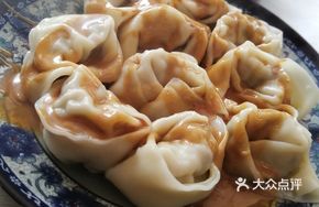 Shiitake Pork Dumplings with Peanut Sauce