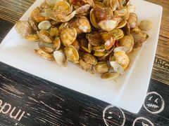 辣炒蛤蜊-1910老鲁味海鲜·戳子肉·青岛菜(金沙滩店)