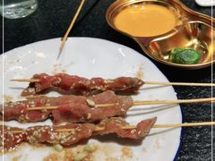-何妹湿辣牛肉·粤式烧烤砂煲(桂雅路店)