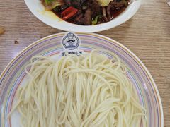 -歹歹的加个面过油肉拌面