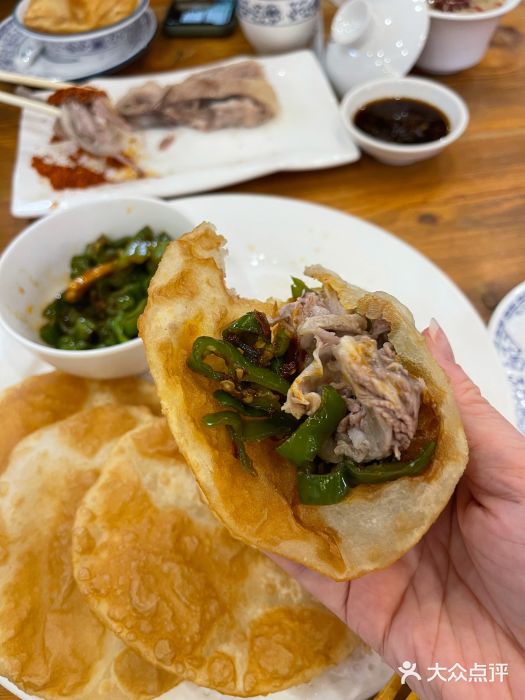 国强手抓(北京西路店)油饼图片