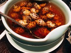 古越陈酿煮花螺-杭州西子湖四季酒店·金沙厅