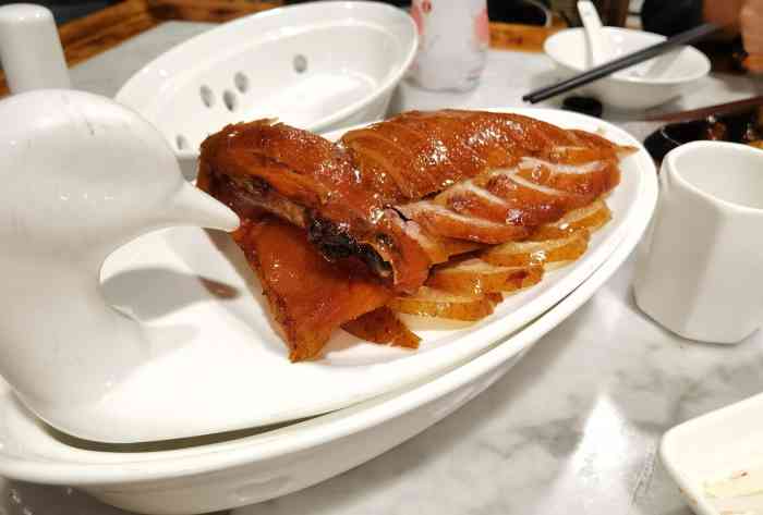 京庭老铺烤鸭(普陀路店)-"环境就是京味烤鸭一贯的装修风格,贵阳几家.