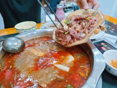 -黄利砖万峰林布依特色酸笋牛肉馆