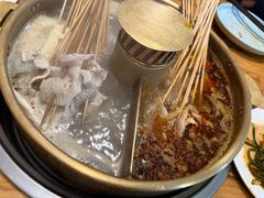 -明何记涮牛肚(品牌首店隋唐植物园南门古城路店)