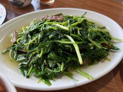 香干炒马兰头-唔呶喔哩酒家(生产街店)