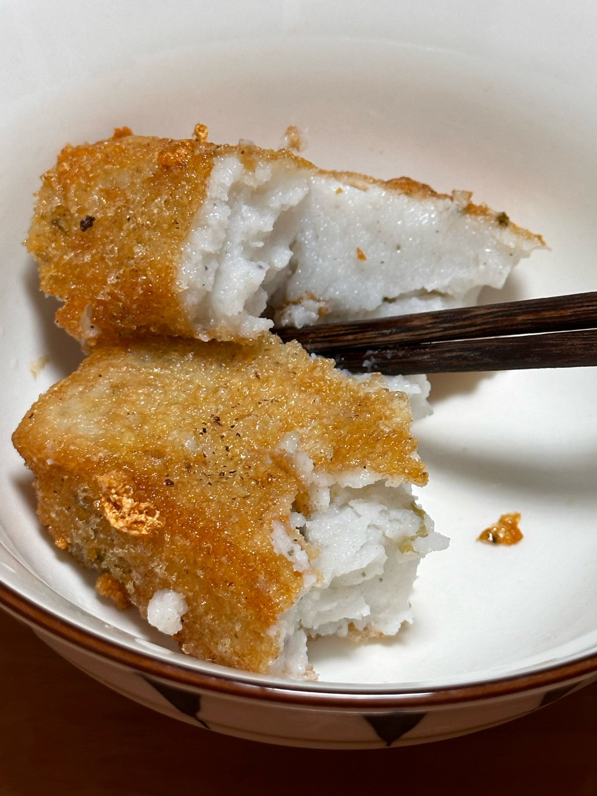 三角糕,也叫芋头糕,福州话叫wo wei