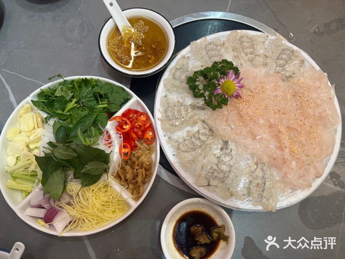 官塘陈记鱼生·潮汕砂锅粥·牛肉火锅(潮枫路总店)图片