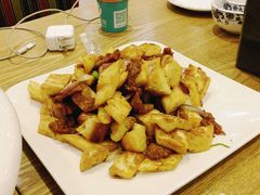 馕丁炒肉-巴依兄弟西域美食(机场店)