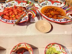 -老牌坊云南鱼豆花火锅(哈西万达店)