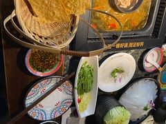 -老牌坊云南鱼豆花火锅(哈西万达店)