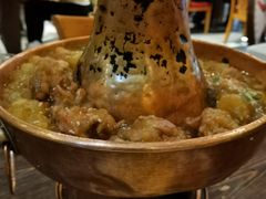 土司铜锅油焖鸡-浩海火烧云傣家菜(京广店)