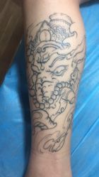 -九纹龙纹身馆