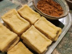 包浆豆腐-浩海火烧云傣家菜(京广店)