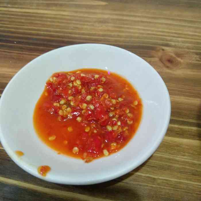 丁三哥老字号-"情歌广场对面 小街上 老字号有烧烤 是.