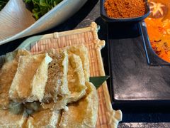 -老牌坊云南鱼豆花火锅(哈西万达店)