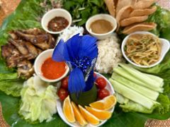 -沐毫傣泐云南菜孔雀宴•手抓饭傣味烧烤(曼听公园店)
