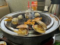 丹东黄蚬子-围炉肉舍•炭烤活鳗•丹东海鲜烤肉(步行街店)