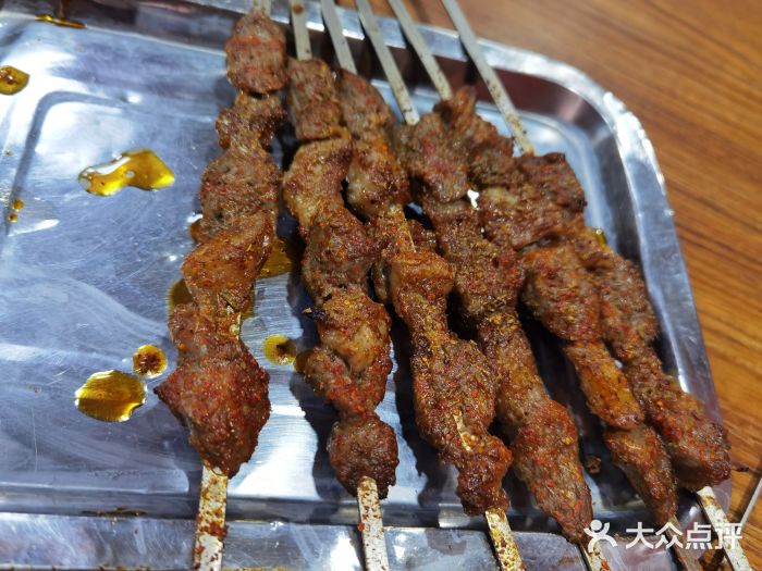 一杆旗抓饭图片