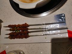 烤羊肉串-三人行骨头王火锅(长寿店)