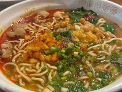 -爆炸头阿姨小四川正宗川味小吃(无任何分店)