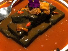 猴头菇鲍汁瑶柱扒制黑豆腐-肴约·花园式餐厅(湖里店)