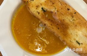 Roasted Almond Pumpkin Porridge with Garlic Bread