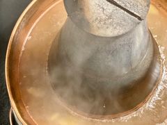 涮完肉的锅-裕德孚·非遗手切涮羊肉(东直门内大街店)
