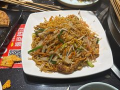 -明何记涮牛肚(品牌首店隋唐植物园南门古城路店)